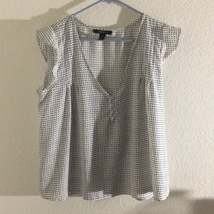 It is a button down blouse